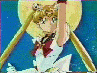 Animated sequence of a blonde anime character in a white and red sailor-style uniform performing a pose with a golden staff against a blue starry background.