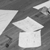 A grayscale pixelated icon shows a white arrow pointing right with a rectangular base, set against dark and light gray background gradients.