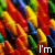 A 2x2 contact sheet of a colorful animated icon featuring overlapping crayons with visible text fragments across frames.