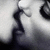 Black-and-white image of two people kissing, with text "I Love You" and a heart symbol overlaid on the right side.
