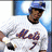A pixelated image shows a person in a white baseball jersey with blue lettering and number, standing against a bright background with orange text reading 'go mets' on the right.