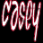 Two side-by-side animated frames of the name "Casey" rendered in stylized red and white text on a black background with visible pixelation.