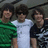 Three people stand side-by-side in a pixelated image; the rightmost person wears a black shirt with white patterns, while text reading LOVE<3 appears on the right.
