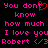 Pixelated text in bright pink on black background with red heart symbol replacing 't' in 'don't', repeated twice side-by-side.