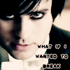 Close-up of a person's face with dark hair and heavy eye makeup, overlaid with pixelated text reading "WHAT DO I WANT TO BREAK".