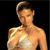 Pixelated image of a person with short light brown hair, wearing a white sleeveless top against a black background.
