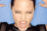 A 5-frame animated contact sheet showing a woman's face zooming in from full facial view to extreme close-up of her eye, with visible mouth and nose details across frames.
