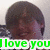 A pixelated image shows a person with dark hair and brown skin, overlaid by bright green text reading "I love you" on a white background.