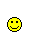 Six pixelated yellow faces with black outlines on gray background; expressions vary from smiling to neutral, some have hair or facial features.