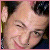 Four- shows a person's face in three and text in the fourth, with pink borders between sections