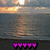 Sunset over water with five pink heart shapes at the bottom, rendered in pixelated style.