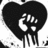 Black and white icon with a raised fist inside a heart shape, featuring dripping effects on the heart's lower edge.