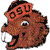 Pixelated red and brown creature with large white eyes, black accents, and visible text on its head.
