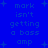 Blue background with repeated text 'mark isn't getting a bass amp' and plus signs in light blue, arranged in a pattern
