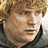 Four pixelated show a character with curly hair and glasses, one featuring 'The Lord of the Rings' text