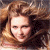 A static image shows a person with light brown hair against a dark background, next to green text reading 'Original Icons .com' on a solid green backdrop.