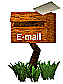 Wooden mailbox with 'E-mail' text, grass base, and paper in slot; paper shifts position across frames.