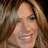 Pixelated image of a smiling person with long brown hair on the left, next to pink text reading 'Jennifer Aniston Rocks <3' on black background.