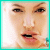 Pixelated close-up of a person's face with teal border, text overlays change across frames from 'ANGEL' to 'ANGELINA'.