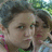 A pixelated image of two people with a black background and cyan text reading "This is what BEST FRIENDS Look Like".