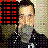 Pixelated image of a person with light hair and dark clothing against a background featuring red squares on black and multicolored pixels.