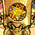 A circular pixelated icon with a golden-yellow center surrounded by multicolored segments in red, blue, green, purple, and orange against a brown background.