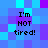 Pixelated of blue and purple squares with four identical text blocks reading "I'm NOT tired!" in black pixel font