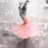 A pixelated image shows a figure in a pink dress with a dark top against a light background, next to red text on a dark red background.