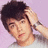 A pixelated image of a person with dark hair against a light purple background, next to purple text on black reading "I LOVE JOE JONAS! <33".