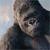 Pixelated static image of a large ape-like creature with dark fur and light facial features against a pale blue sky background.