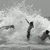 Black-and-white animated sequence showing a figure in a dynamic pose with arms raised against a wave-like background, transitioning between two distinct poses.