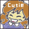 Pixelated cartoon character with brown hair and purple shirt, smiling widely with closed eyes