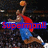 Pixelated image of a basketball player in mid-air shooting, wearing red and blue uniform with orange ball above head.