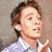 A 48x48 pixel buddy icon split into two frames showing a person in a checkered shirt on the left and green text "Original Icons .com" on a dark background on the right, with visible pixelation and dithering effects.