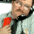 A three- animated sequence shows a man in a light gray shirt and dark tie holding red staplers, with text reading "I Have My Stapler" below