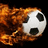 A soccer ball engulfed in orange and brown flames against a black background, with pixelated text on red