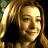 A 48x48 pixel buddy icon featuring a split composition with a person on the left and green text on the right against a dark background.