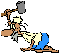 Pixelated cartoon character in blue shorts and white shirt kneels while swinging a hammer, with smoke rising from a metal object below.