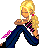 Pixel art of a blonde woman in blue jeans and black top with pink accents, seated with legs spread, holding hands near chest.