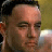 A 48x48 pixel animated contact sheet showing a character from Forrest Gump with text fragments "stupid is as" and "stupid does" across two dark brown panels, arranged in a 2x2 grid on a gray background.