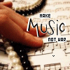 A hand plays piano keys over sheet music with text 'MAKE Music NOT WAR' overlaid, showing a static image with no visible animation changes.