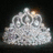 Pixelated image of a light-colored, textured object resembling a pile of fabric or a mound of material with a small bright spot on top, next to pink pixelated text reading "princess for life" on a black background.