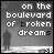 A grayscale animated icon shows a silhouetted figure walking left to right across a textured ground, with text reading "on the boulevard of broken dreams" above.