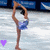 A figure skater in a blue dress performs a split on ice, with one leg extended upward and arms raised above the head.