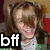 Pixelated image of a person with light brown hair styled in pigtails, wearing sunglasses and a white shirt under a green jacket, with 'bff' text overlay.