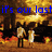 Two figures stand holding hands in a pixelated landscape with fiery orange and yellow background, blue text reading "it's our last chance to make it right".