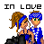 Pixel art icon showing two cartoon characters with blue hair standing close together under the text "IN LOVE" on a white background.