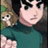 A pixelated image shows a person with dark hair wearing a teal shirt holding a small brown and white dog against a green background.