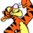 Pixelated orange tiger with black stripes wearing yellow shirt and purple gem on head, holding white star in right hand.