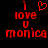 Red pixelated text and symbols on black background: 'I' with heart symbol above, 'love', 'U', 'monica' stacked vertically.